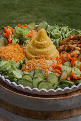 Obraz premium A vibrant and colorful spread of fresh vegetables along with delicious snacks perfectly suited for gatherings