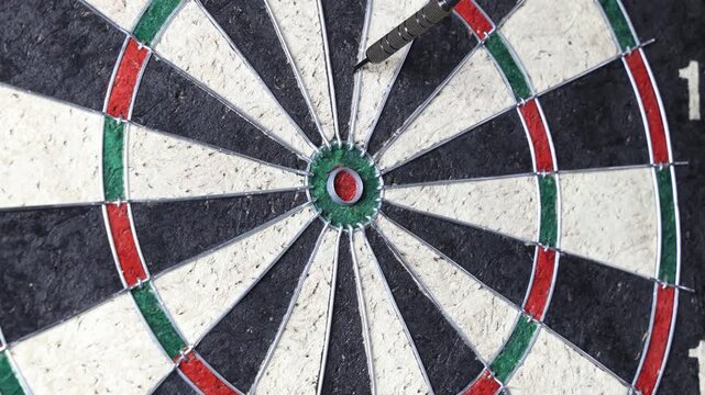 darts hitting cork dartboard target