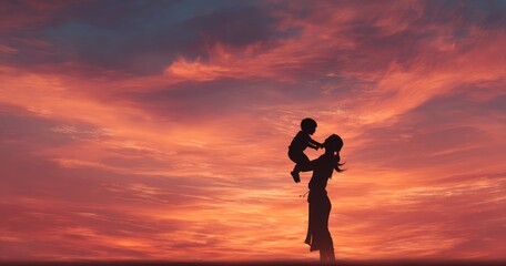 Fototapeta premium Silhouette of mother and child against colorful sunset sky with copy space