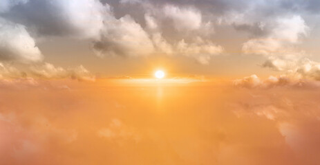 The sun over clouds on the sky, sunrise backgrounds