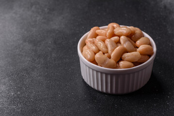 Canned white beans, prepared as an ingredient for a classic English breakfast. Canned beans