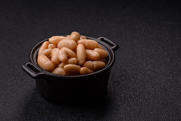 Canned white beans, prepared as an ingredient for a classic English breakfast. Canned beans