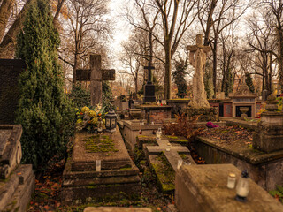 Autumn Cemetery Scene With Mossy Tombstones, Crosses, and Serene Tombs in Quiet Grounds