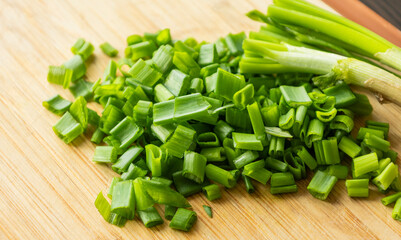 Sliced Fresh Green Onion on Wooden Cutting Board