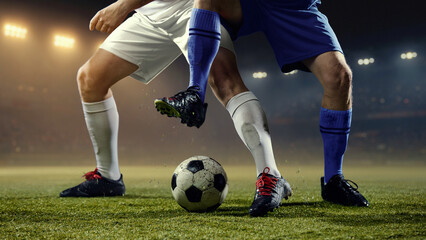 Intense football rivalry moment with two professional players fighting for ball. Concept of...