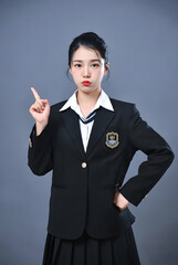 A Korean school woman, on a solid color background,Giving directions with one hand, Blazer uniform