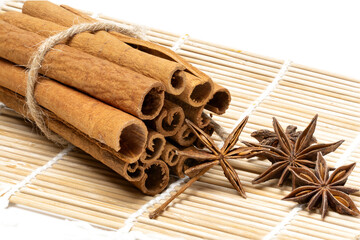Star Anise and Cinnamon Sticks on Bamboo Mat
