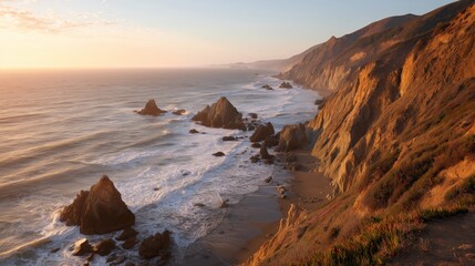 Scenic coastline view at sunset with waves crashing on rocky shore