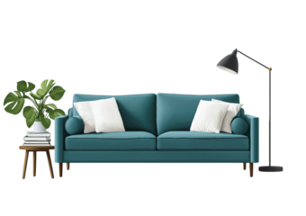 Teal blue sofa with white pillows and a floor lamp next to a plant on a stool isolated on a transparent background