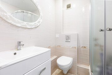 modern bathroom room with toilet and washing machine