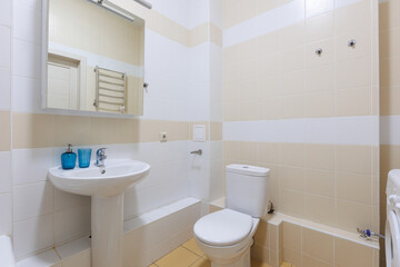 modern bathroom room with toilet and washing machine