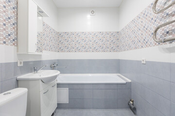 modern bathroom room with toilet and washing machine