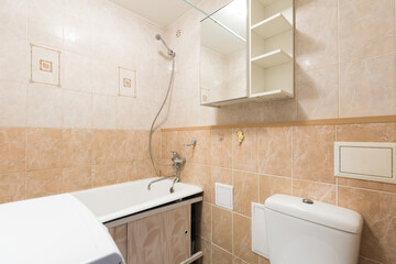 modern bathroom room with toilet and washing machine