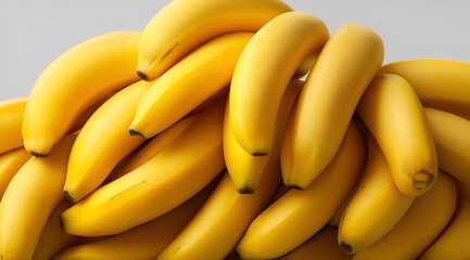 A vibrant pile of ripe bananas showcasing their bright yellow skin, perfect for healthy snacks or smoothies.