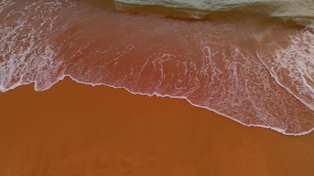 Drone Tilt Down Shot Revealing 2026 Written in Beach Sand