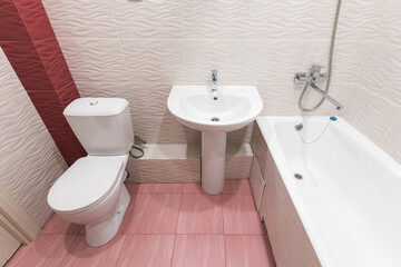 modern bathroom room with toilet and washing machine