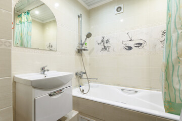modern bathroom room with toilet and washing machine