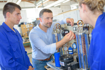 Student technicians on practical course