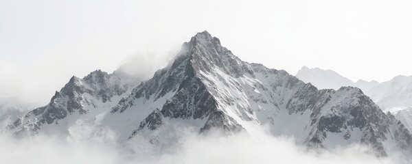 Majestic snowy mountain peak emerges from low clouds. Rugged terrain covered in white snow. Dramatic contrast between dark rock and bright snow create minimalist winter landscape.