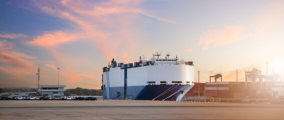 Close up vehicle carrier vessel loading car for shipping to worldwide, Large RoRo (Roll on off) vehicle car carrier, New car lined up in the port for import export around the world.