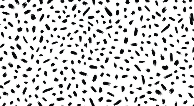 Abstract seamless pattern with chaotic black brush strokes and dots on a white background for a modern design.