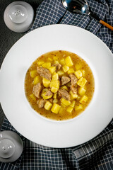 Borscht with potato and white sausage.