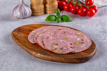 Italian mortadella pork sausages slices