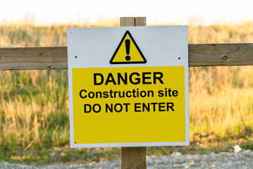 Do not enter sign on a wooden fence at  building site