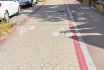 Empty two way bicycle lane in a city centre on a sunny summer day