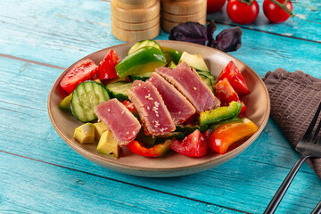 Salad with tuna tataki and avocado