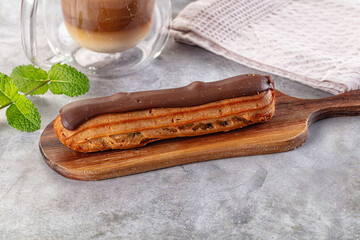 Gourmet chocolate eclair with icing