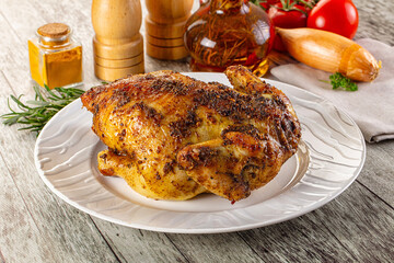 Baked in oven whole chicken with spices