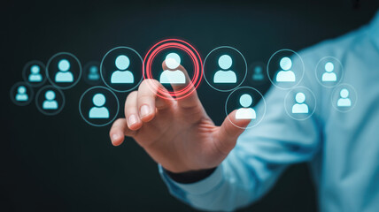 Businessman selecting a person icon for networking or team management
