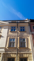 European street with old multi-storey buildings on a sunny day