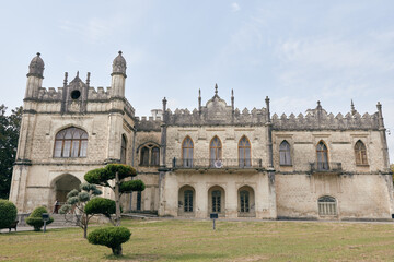 Obraz premium Mansion manor historic architecture facade estate castle building on lawn and garden