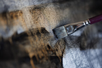 Abstract painting on canvas close-up. Paint drips.