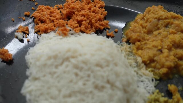 A fresh morning breakfast with string hoppers, dhal curry and coconut sambal