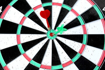 Darts with darts are on a white background.	