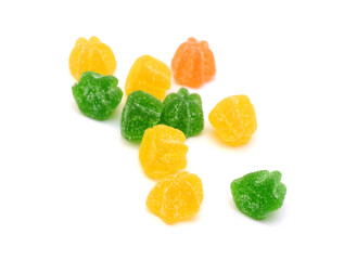 Pile of tasty colorful jelly candies on white background, top view