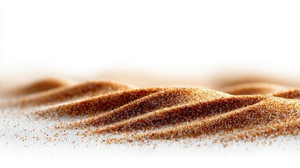 Fine granular material forming soft, rippling waves against a stark white background