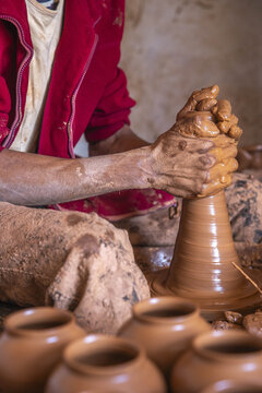 Potter at work in a workshop, Safi, Morocco
