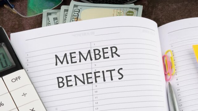 Member Benefits, e-commerce conceptual. Animation of the conceptual text of MEMBER BENEFITS in an open business notebook on a blank sheet