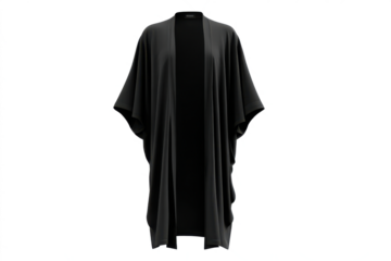 A woman wearing a black and white graduation dress and gown, standing in a studio with a clean white background.