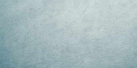 Seamless blue paper texture and abstract background pattern featuring a rough grunge surface with a vintage blank canvas design for an empty textured wallpaper backdrop