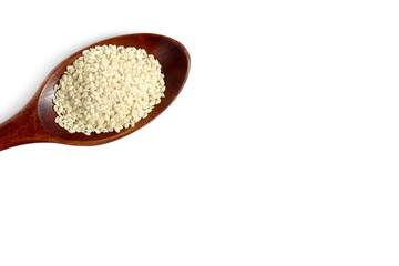 There is a wooden spoon with white rice on a white background.	