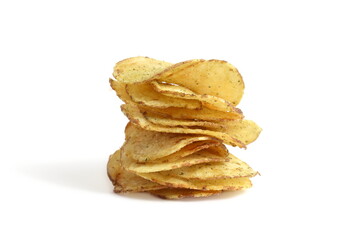 Potato chips are stacked on top of each other on a white background.	