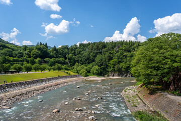 Sho River flowing through the village of Shirakawa-go, Japan