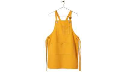 Yellow work apron on hanger isolated PNG, professional chef or barista uniform for cooking and crafting on transparent background