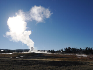 Sunburst Behind Massive Geyser Steam Cloud