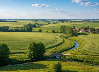 Fototapeta premium Serene Landscape with Farmland, River, and Scenic Horizon View